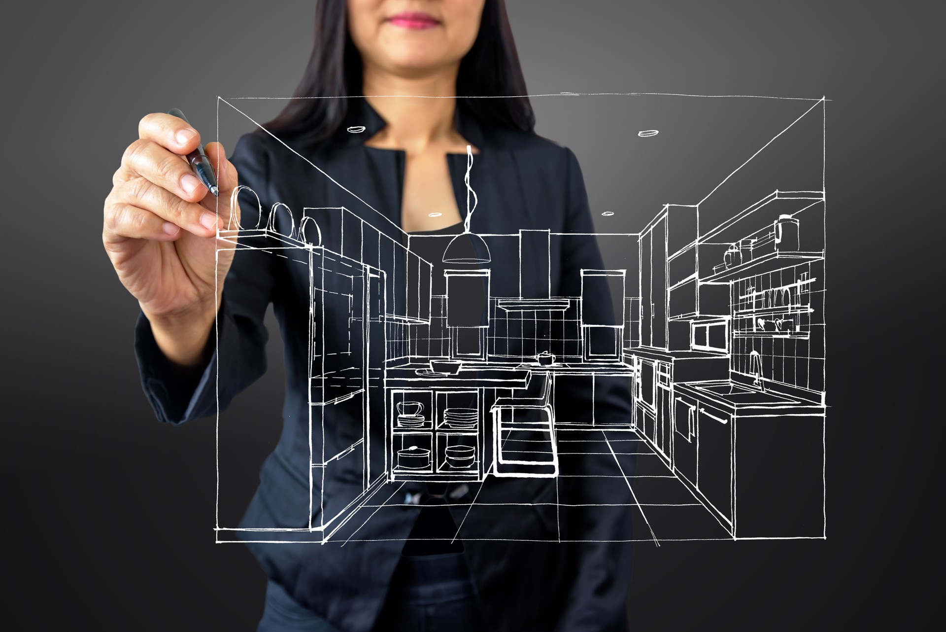 Businesswoman (Architect / Interior designer) drawing on modern futuristic virtual screen